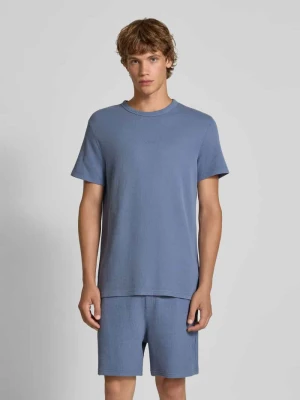 T-shirt o kroju slim fit ze strukturalnym wzorem Tommy Jeans Jeansowy niebieski