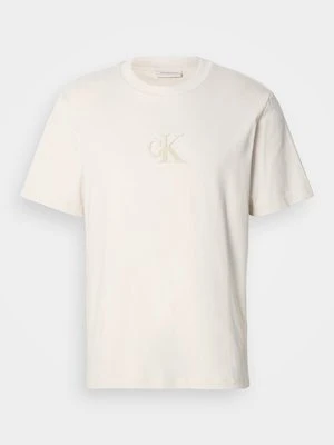T-shirt z nadrukiem Calvin Klein Jeans beżowy