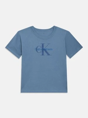 T-shirt z nadrukiem Calvin Klein Jeans jasnoniebieski