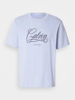T-shirt z nadrukiem Calvin Klein Jeans jasnoniebieski