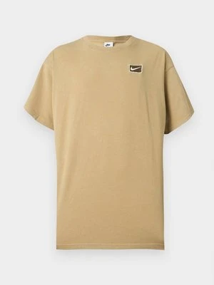T-shirt z nadrukiem Nike beżowy