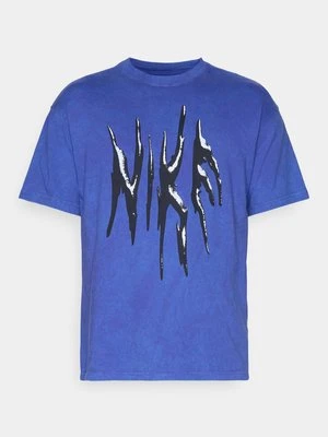 T-shirt z nadrukiem Nike Performance