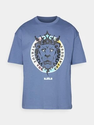 T-shirt z nadrukiem Nike Performance