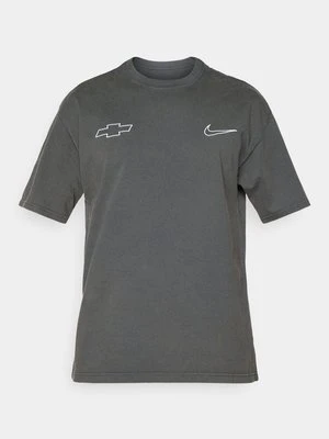 T-shirt z nadrukiem Nike Performance
