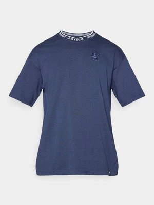 T-shirt z nadrukiem Nike Performance