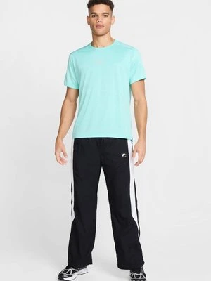 Zdjęcie produktu T-shirt z nadrukiem Nike turkusowy