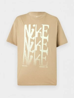 T-shirt z nadrukiem Nike beżowy