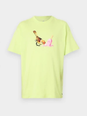 T-shirt z nadrukiem Nike żółty