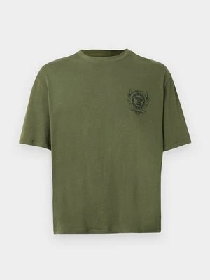 T-shirt z nadrukiem Tommy Jeans