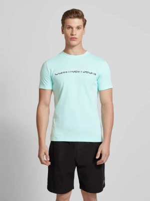 T-shirt z nadrukiem z logo model ‘MIXED INSTITUTIONAL’ Calvin Klein Jeans