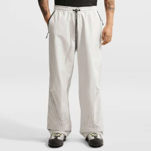Tech Dri-FIT Shori Open-Hem Pants Nike beż