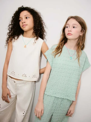 Teksturowana koszulka z kokardami bladozielony - Dzieci - lata - MANGO KIDS