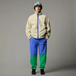 The North Face Polarowe Joggersy Tnf X Yinka Ilori Unisex Solar Blue-optic Emerald Rozmiar XS male