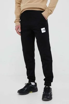 The North Face spodnie dresowe bawełniane kolor czarny z nadrukiem NF0A827GJK31