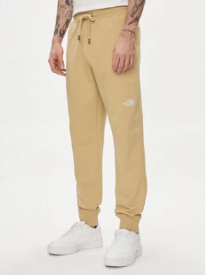 The North Face Spodnie dresowe Nse Light NF0A4T1F Beżowy Regular Fit