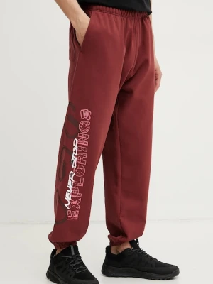 The North Face spodnie dresowe TNF X NSE męskie kolor bordowy z nadrukiem NF0A8C3W0VO1