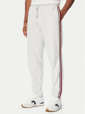 Tommy Hilfiger Spodnie dresowe UM0UM03944 Szary jasny Regular Fit