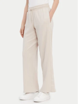 Tommy Hilfiger Spodnie dresowe UW0UW04771 Beżowy Relaxed Fit