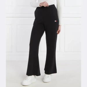 Tommy Jeans Spodnie dresowe BADGE WIDE EXT | flare fit