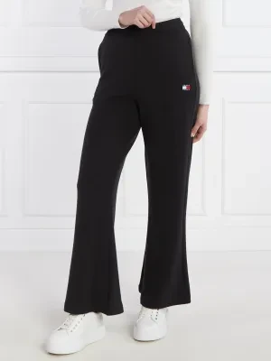 Tommy Jeans Spodnie dresowe BADGE WIDE EXT | flare fit