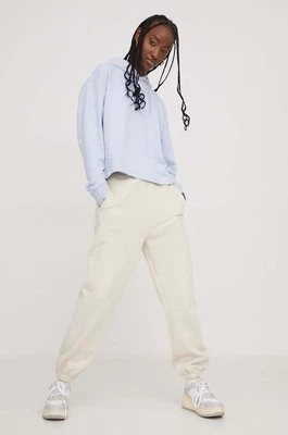 Tommy Jeans spodnie dresowe bawełniane kolor beżowy z aplikacją DW0DW17309