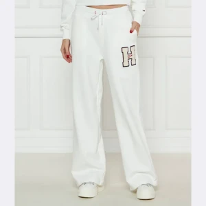 Tommy Jeans Spodnie dresowe | flare fit