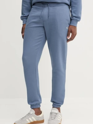 Tommy Jeans spodnie dresowe kolor niebieski gładkie DM0DM20473