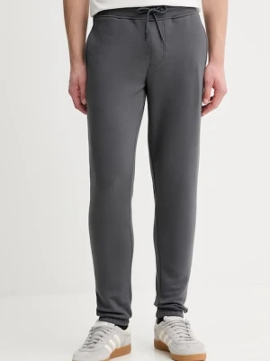 Tommy Jeans spodnie dresowe kolor szary gładkie DM0DM20473