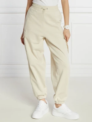 Tommy Jeans Spodnie dresowe | Regular Fit beżowy