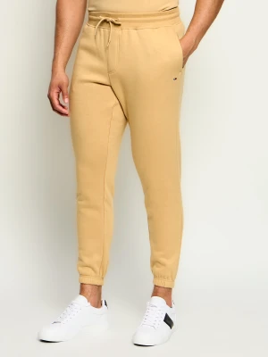 Tommy Jeans Spodnie dresowe | Slim Fit beżowy