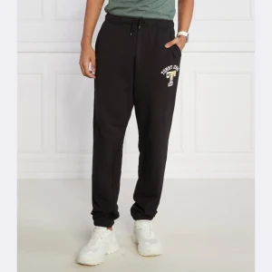 Tommy Jeans Spodnie dresowe TJM RLX LUXE GRAPHIC | Regular Fit