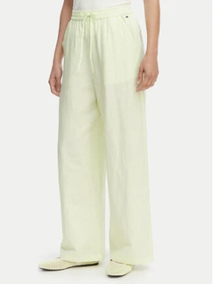 Tommy Jeans Spodnie materiałowe DW0DW22285 Zielony jasny Loose Fit