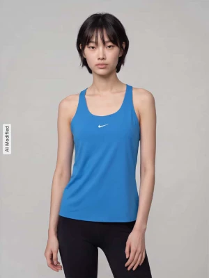 Top sportowy o kroju slim fit z nadrukiem z logo model 'Pro' Nike Niebieski