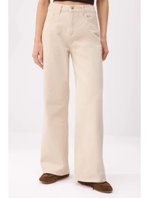 trendyol Dżinsy - Comfort fit - w kolorze beżowym rozmiar: 38