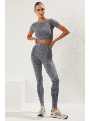 trendyol Legginsy sportowe w kolorze szarym rozmiar: M/L