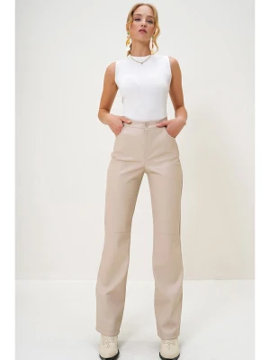 trendyol Spodnie w kolorze beżowym rozmiar: M