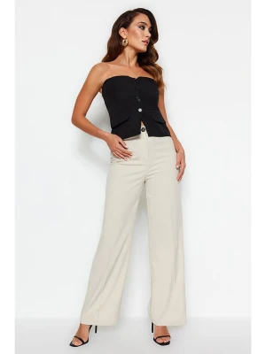 trendyol Spodnie w kolorze kremowym rozmiar: 40
