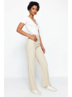 trendyol Spodnie w kolorze kremowym rozmiar: 36
