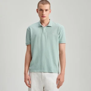 Turkusowa koszulka polo z małym haftem House