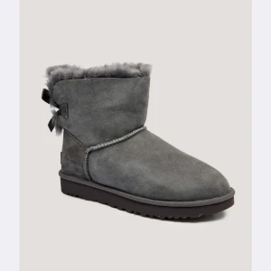UGG Skórzane śniegowce MINI BAILEY BOW II | z dodatkiem wełny | shearling