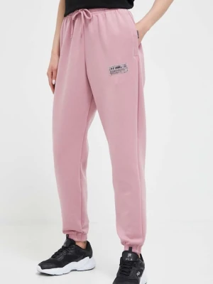 Under Armour spodnie dresowe różowy