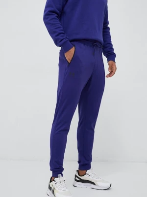Under Armour spodnie dresowe kolor fioletowy gładkie 1290261