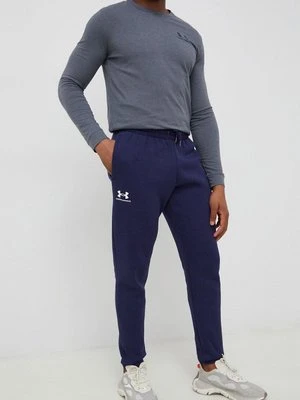 Under Armour spodnie dresowe męskie kolor granatowy gładkie 1373882