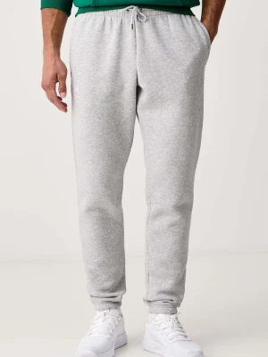 Under Armour spodnie dresowe męskie z bawełną Essential Fleece szary
