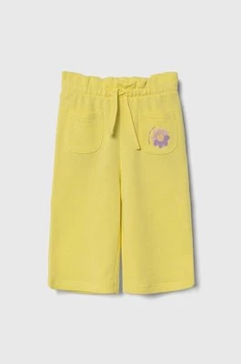 United Colors of Benetton spodnie dresowe bawełniane dziecięce kolor żółty gładkie