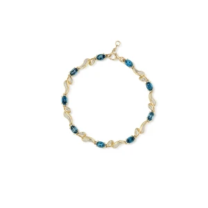 W.KRUK Bransoleta złota z diamentami i topazami