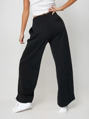 Weekday Spodnie w kolorze czarnym rozmiar: M