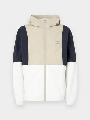 Wiatrówka Tommy Jeans biały