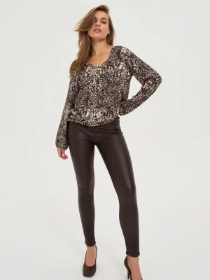 Woskowane spodnie brązowe Moodo