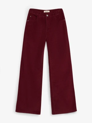 Wygodne spodnie sztruksowe, loose fit BonPrix czerwony